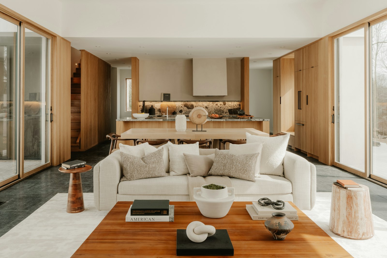 The finished living room and kitchen of the Užupis apartment